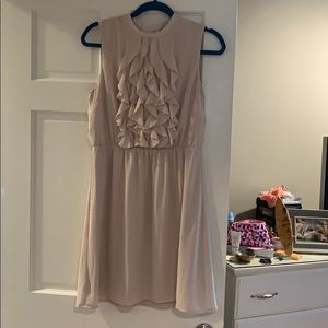 Beige mid length sleeveless dress
